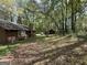 View of a large backyard, partially wooded at 5350 Hearn, Ellenwood, GA 30294