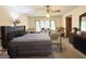 Bedroom with bay window, carpet, and a large bed at 5350 Hearn, Ellenwood, GA 30294