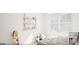 Charming bedroom with playful decor, a window, and cozy atmosphere at 1246 Trombone Way # 111, Mcdonough, GA 30252