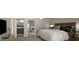 Well-lit main bedroom with bathroom access, sleek decor, and floorplan view at 2024 Piccolo Ct # 228, Mcdonough, GA 30252