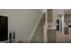 Carpeted staircase leading to the upper level, showcasing the home's modern design and functional layout at 2024 Piccolo Ct # 228, Mcdonough, GA 30252