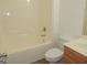 Bathroom with a tub and a toilet with vanity at 376 Turner Cir, Mcdonough, GA 30252