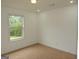 Bedroom with carpet and natural light through a window at 376 Turner Cir, Mcdonough, GA 30252