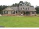 Inviting single-story home with a well-manicured lawn and charming curb appeal at 376 Turner Cir, Mcdonough, GA 30252
