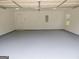 Spacious garage with a gray floor at 376 Turner Cir, Mcdonough, GA 30252
