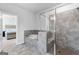 Beautiful bathroom with a tub and walk-in shower and a view into the bedroom at 510 Cunninghame Ct, Peachtree City, GA 30269