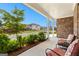 Inviting front porch with comfortable seating, offering a relaxing outdoor space with scenic neighborhood views at 510 Cunninghame Ct, Peachtree City, GA 30269