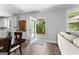 Open-concept living room with access to the kitchen, dining area, and outdoor space for easy entertaining at 510 Cunninghame Ct, Peachtree City, GA 30269