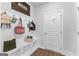 Functional mudroom featuring a built-in bench, coat hooks, and ample storage space at 510 Cunninghame Ct, Peachtree City, GA 30269