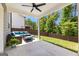 Relaxing outdoor patio with a comfortable seating area and a ceiling fan at 510 Cunninghame Ct, Peachtree City, GA 30269