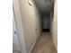 Image of a hallway with carpet and white doors at 5257 Carrie Dr, Morrow, GA 30260