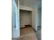 Convenient laundry room with washer and dryer hookups, and an overhead rack for storing clothes at 5257 Carrie Dr, Morrow, GA 30260