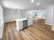 Stylish kitchen island with seating, modern appliances, and plenty of counter space at 355 New Marietta Hwy, Roswell, GA 30075