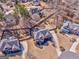 Aerial view highlighting a residential area with well-maintained lawns and mature trees surrounding beautiful homes at 4213 Bretdale Nw Run, Kennesaw, GA 30152