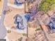 Aerial view of the house showcasing the roof, backyard, and surrounding landscaping and neighborhood at 4213 Bretdale Nw Run, Kennesaw, GA 30152