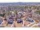 Aerial view showcasing a suburban neighborhood with single-Gathering homes and lush greenery in the background at 4213 Bretdale Nw Run, Kennesaw, GA 30152