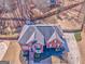 Aerial view of a two-story brick home featuring a pristine roof and a well-maintained yard at 4213 Bretdale Nw Run, Kennesaw, GA 30152