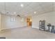 Spacious carpeted basement featuring recessed lighting and large windows at 4213 Bretdale Nw Run, Kennesaw, GA 30152