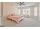 Bedroom with carpet, fan, natural light, and neutral color scheme at 4213 Bretdale Nw Run, Kennesaw, GA 30152