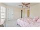 Bedroom featuring a fan, carpet, and plenty of natural light at 4213 Bretdale Nw Run, Kennesaw, GA 30152