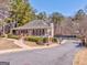 Charming clubhouse with a welcoming front porch, well-maintained landscaping, and convenient parking at 4213 Bretdale Nw Run, Kennesaw, GA 30152