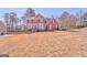 Beautiful two-story brick house with meticulous landscaping and a charming entrance at 4213 Bretdale Nw Run, Kennesaw, GA 30152