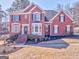 Beautiful two-story brick home featuring manicured landscaping and a classic architectural design at 4213 Bretdale Nw Run, Kennesaw, GA 30152