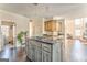 Kitchen with wood cabinets, granite counters, stainless appliances, and center island at 4213 Bretdale Nw Run, Kennesaw, GA 30152