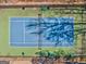 Aerial view of tennis court featuring blue and green surface, net, and surrounding fence at 4213 Bretdale Nw Run, Kennesaw, GA 30152