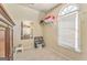 Walk-in closet featuring built-in shelving and a window for natural light at 4213 Bretdale Nw Run, Kennesaw, GA 30152