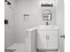 Bathroom featuring white vanity, vessel sink, and tiled walk-in shower at 474 Autumn Dr, Riverdale, GA 30274
