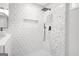 Walk-in shower featuring mosaic tile and rainfall showerhead at 474 Autumn Dr, Riverdale, GA 30274