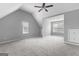 Spacious bedroom with vaulted ceilings, neutral carpet, and double windows at 4506 White Rd, Douglasville, GA 30135