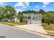 Two-story home featuring a well-manicured lawn, two-car garage, and a welcoming entrance at 4506 White Rd, Douglasville, GA 30135