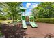 Playground set with slides and a walking path for families to enjoy at 4506 White Rd, Douglasville, GA 30135