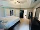 Spacious bedroom with trey ceiling, neutral colors, and dark wood furniture at 110 Shelby Oaks Trl, Covington, GA 30016