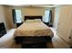 Bedroom featuring a large bed, matching nightstands, and ample natural light at 110 Shelby Oaks Trl, Covington, GA 30016