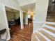 Open foyer with hardwood floors leading to adjacent rooms at 110 Shelby Oaks Trl, Covington, GA 30016