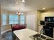 Charming kitchen with an eat-in area and stainless steel double sink at 110 Shelby Oaks Trl, Covington, GA 30016