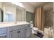 Clean bathroom featuring a shower-tub combo, brushed silver fixtures, and neutral paint at 4752 Albany Way, South Fulton, GA 30331