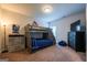 Bedroom with a bunk bed, TV, storage, and brown carpet at 4752 Albany Way, South Fulton, GA 30331