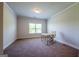 Bright office space with modern desk, chair, and a sunlit window at 4752 Albany Way, South Fulton, GA 30331