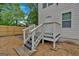 Backyard featuring a staircase, patio and partial privacy fence at 786 Neal Nw St, Atlanta, GA 30318