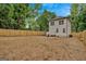 Spacious backyard featuring a new wood fence and ample room for outdoor activities and entertainment at 786 Neal Nw St, Atlanta, GA 30318