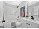 Modern bathroom with a shower-tub, framed print, and a white vanity at 786 Neal Nw St, Atlanta, GA 30318