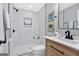 Modern bathroom showcasing a tiled shower, stylish vanity, and updated fixtures at 786 Neal Nw St, Atlanta, GA 30318