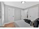 Bright bedroom with wood floors, neutral wall color, and natural light at 786 Neal Nw St, Atlanta, GA 30318