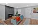 Well-lit living room with a fireplace, modern decor, and plenty of natural light at 786 Neal Nw St, Atlanta, GA 30318