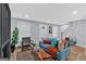 Spacious living room featuring hardwood floors, fireplace, and comfortable seating at 786 Neal Nw St, Atlanta, GA 30318