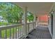 Inviting front porch with classic railing, offering a perfect spot for relaxation at 786 Neal Nw St, Atlanta, GA 30318